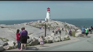 PEGGYS POINT LIGHTHOUSE and PEGGYS COVE  30 MILES FROM HALIFAX NOVA SCOTIA [upl. by Moyra]